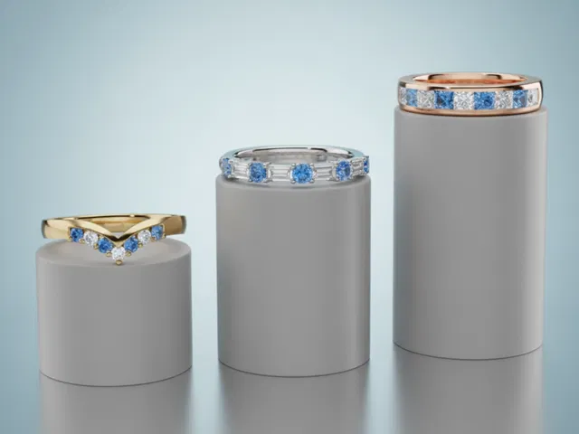 Swiss Blue Topaz and Diamond Eternity Rings